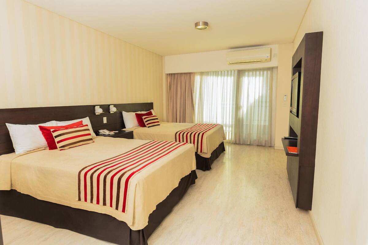 Premium bedding, down comforters, pillowtop beds, minibar