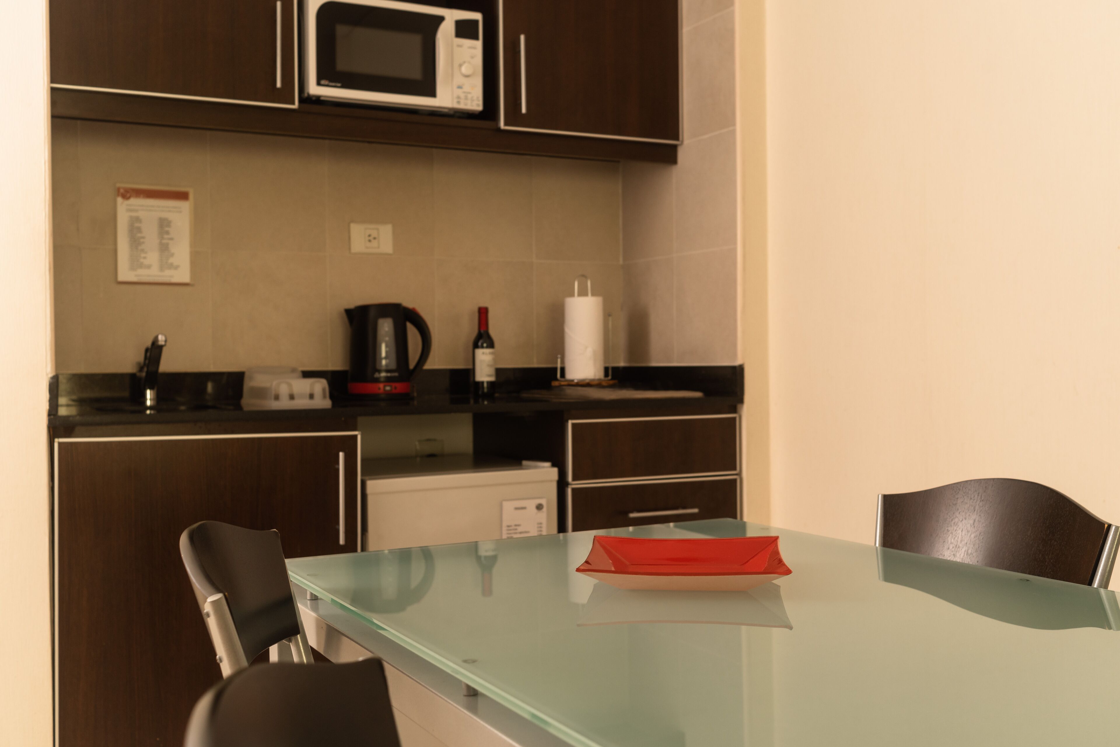 mini-fridge, microwave, coffee/tea maker, electric kettle