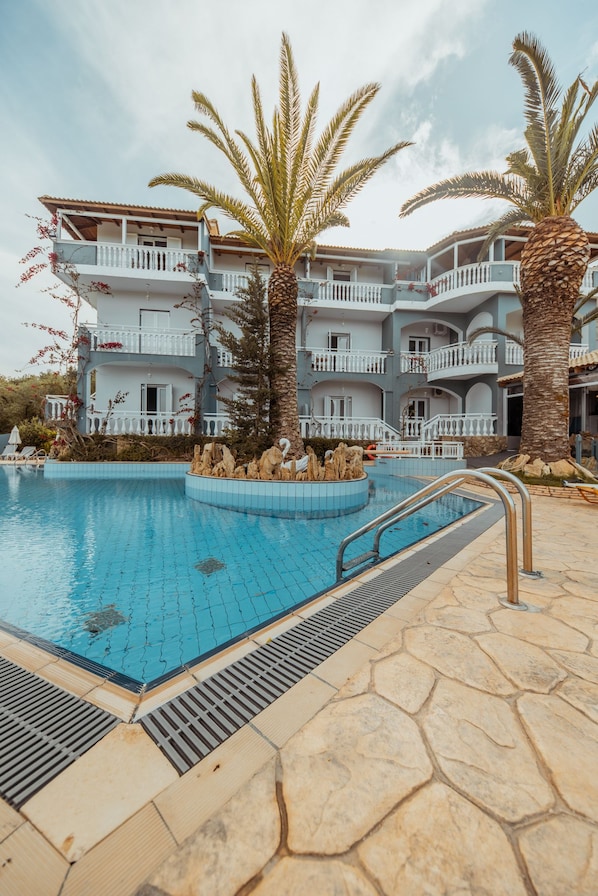 2 outdoor pools, pool umbrellas, sun loungers