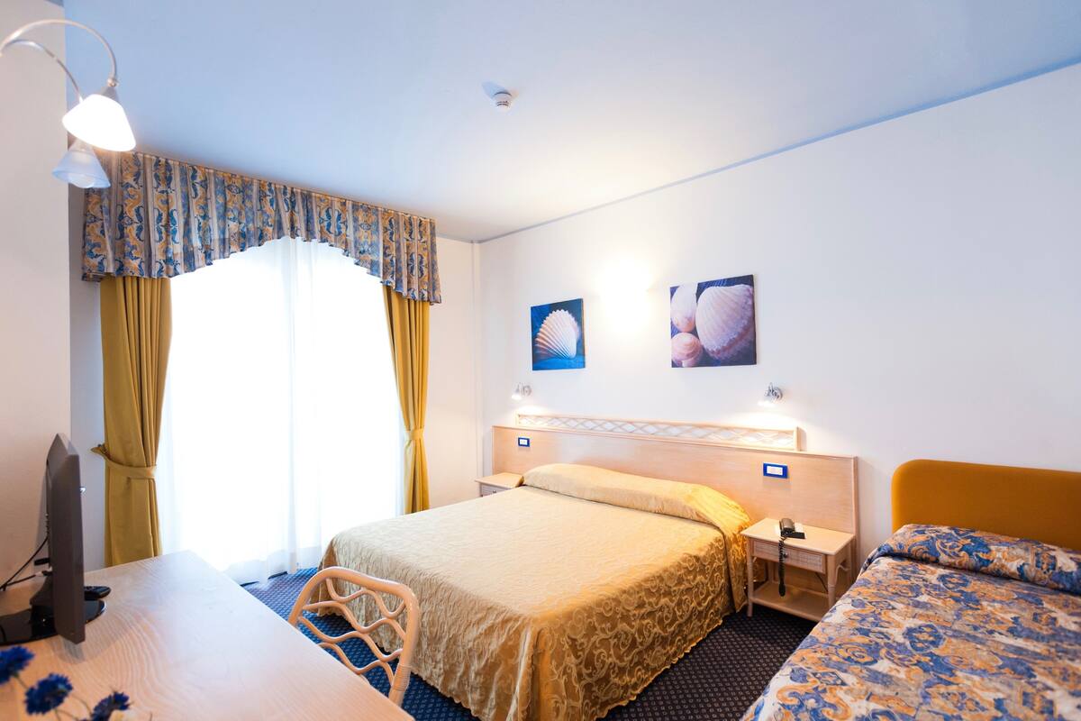 Quadruple Room, Ocean View | Minibar, in-room safe, desk