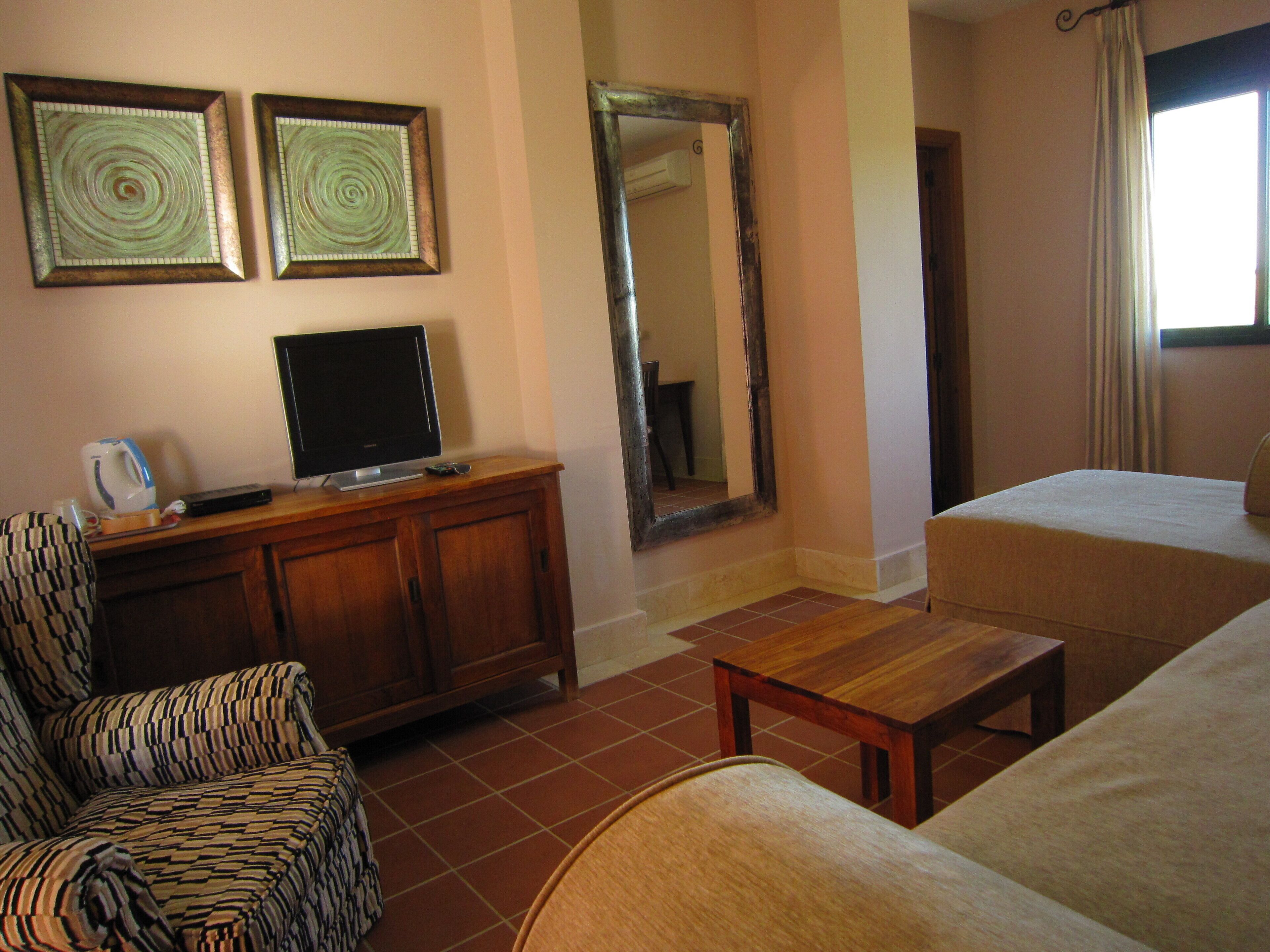 family studio suite | minibar, in-room safe, desk, laptop workspace