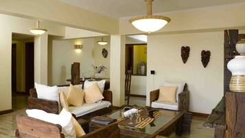 One Bedroom Suites | Living room | Flat-screen TV