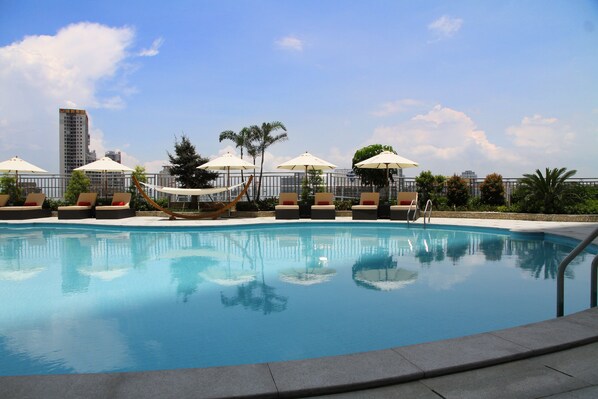 Indoor pool, 3 outdoor pools, open 8 AM to 10 PM, pool umbrellas