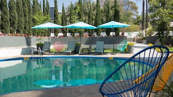 Outdoor pool, pool umbrellas, pool loungers