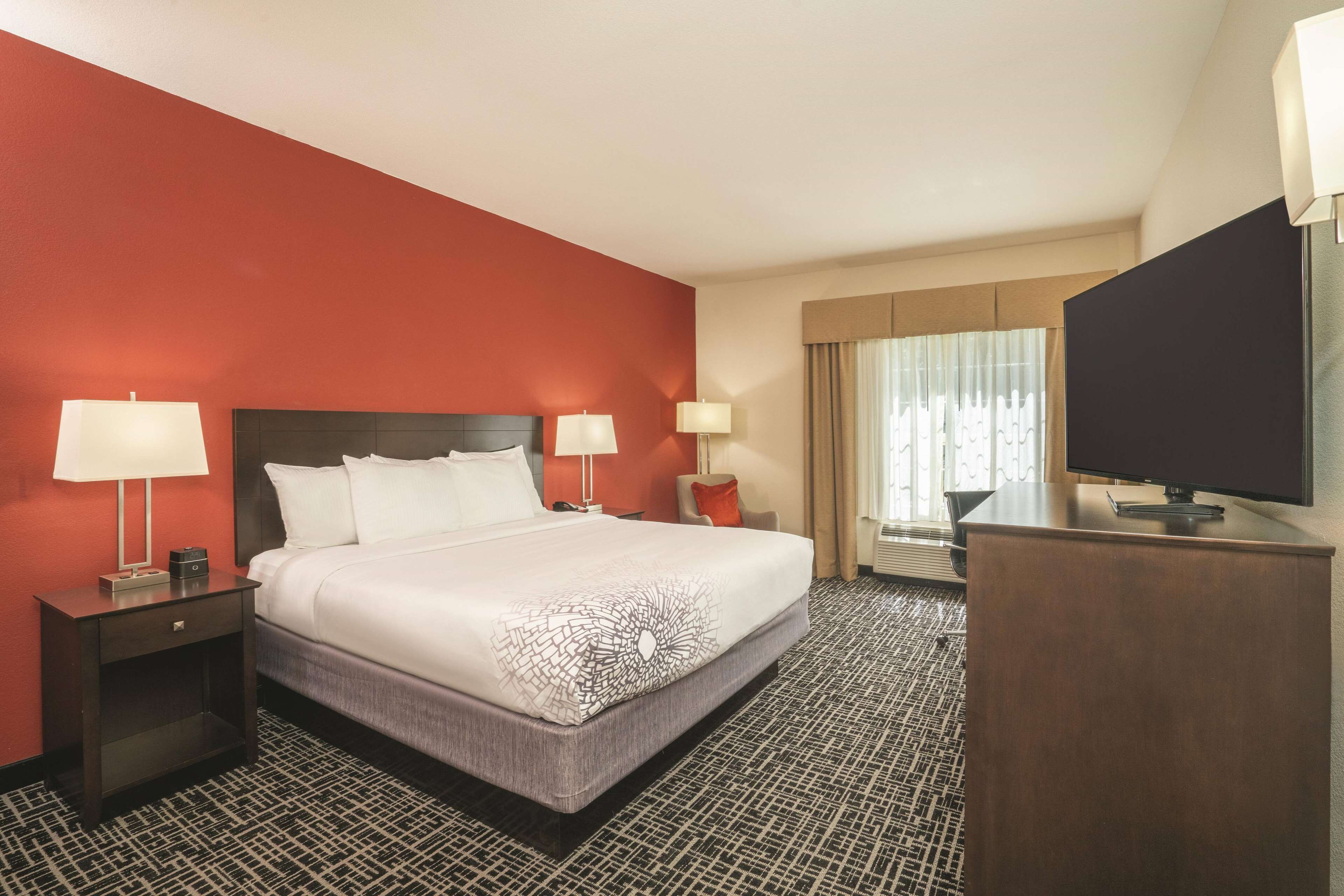 premium bedding, pillow-top beds, desk, blackout curtains