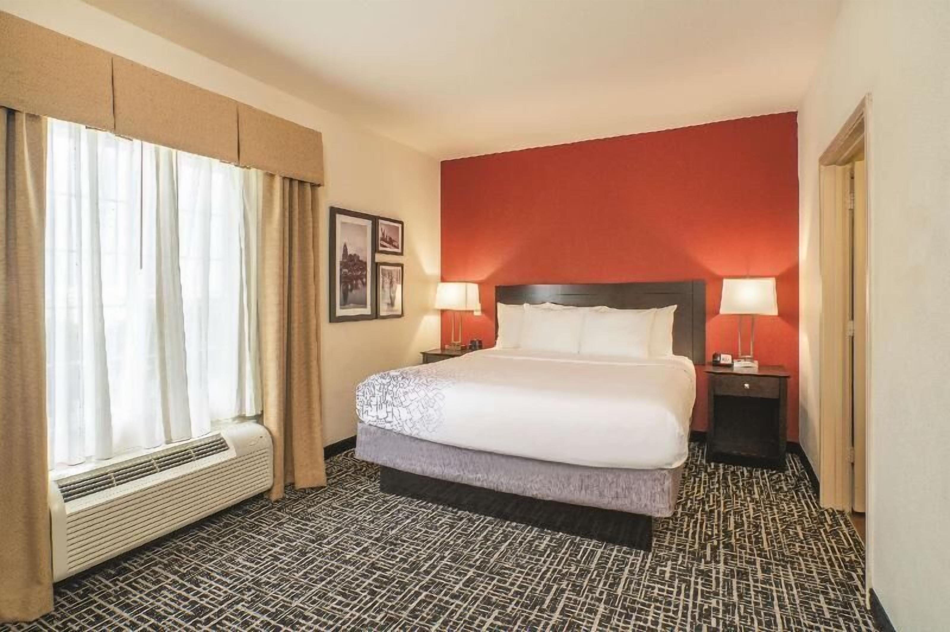 Premium bedding, pillowtop beds, desk, blackout drapes