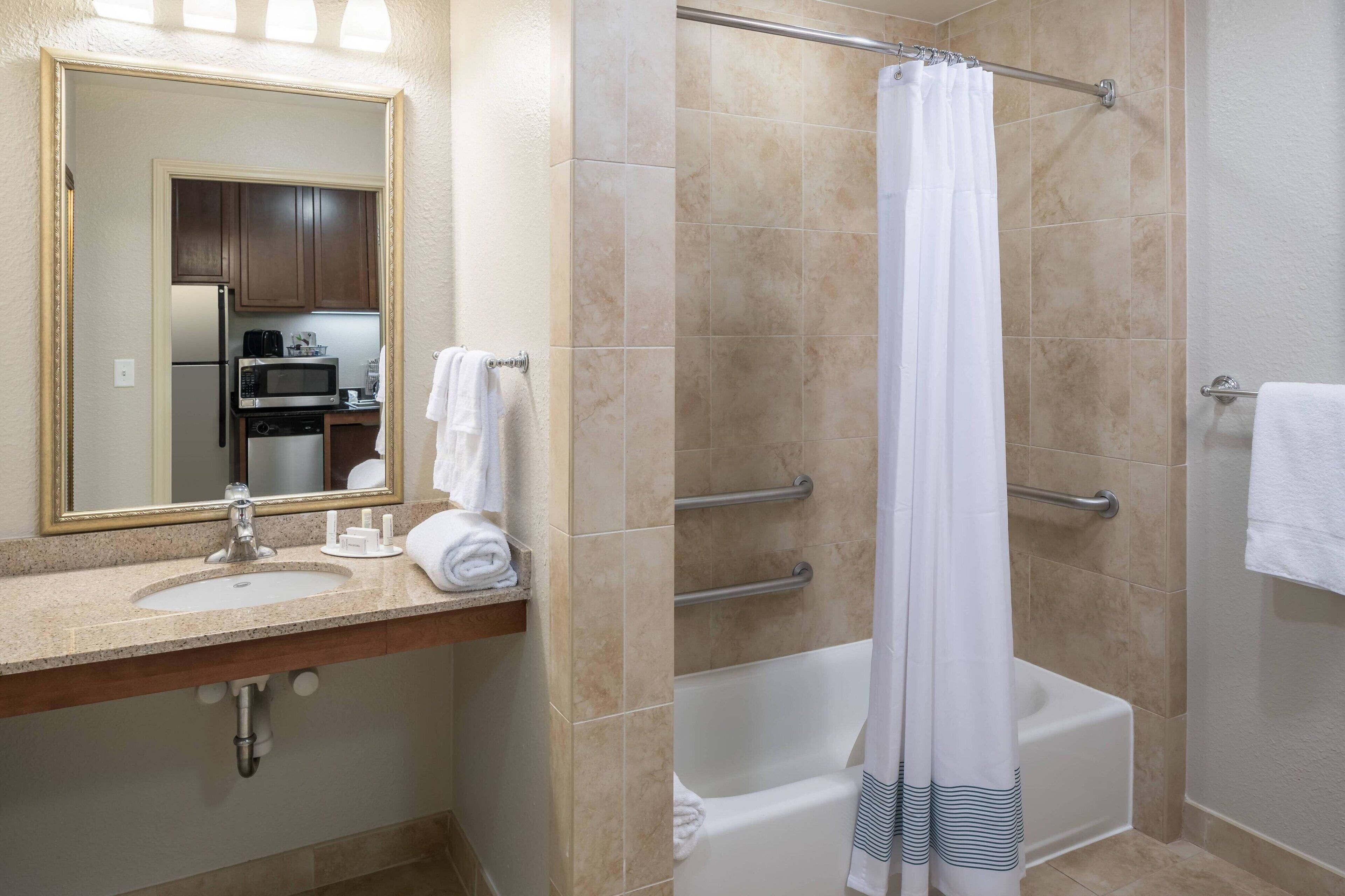 combined shower/bathtub, free toiletries, hair dryer, towels