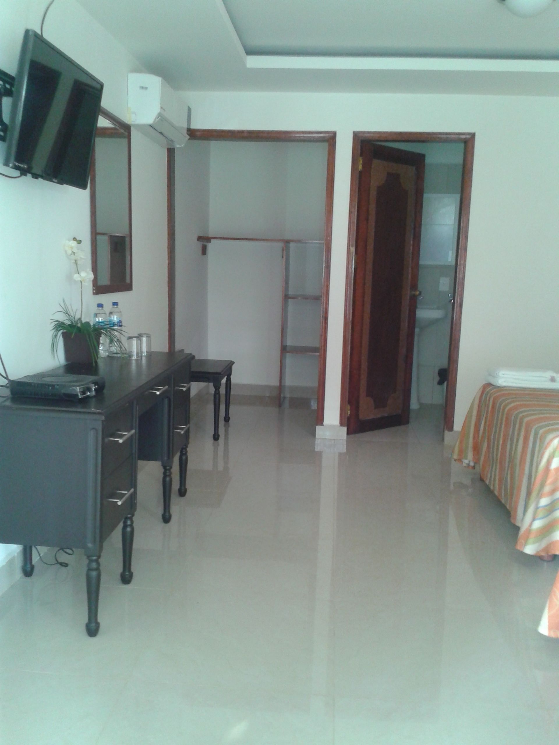 premium room, 2 queen beds, garden view | in-room safe, bed sheets, alarm clocks