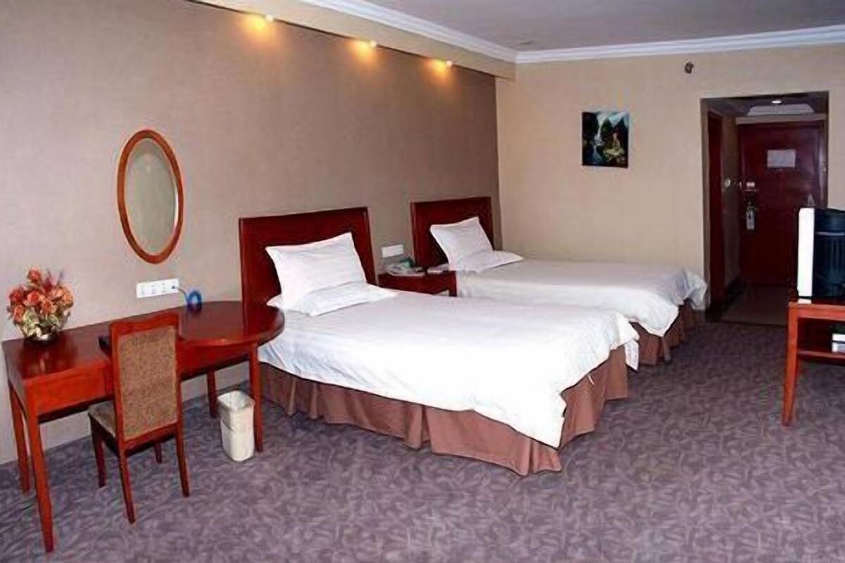 Twin Room | Desk, blackout drapes, iron/ironing board (on request)