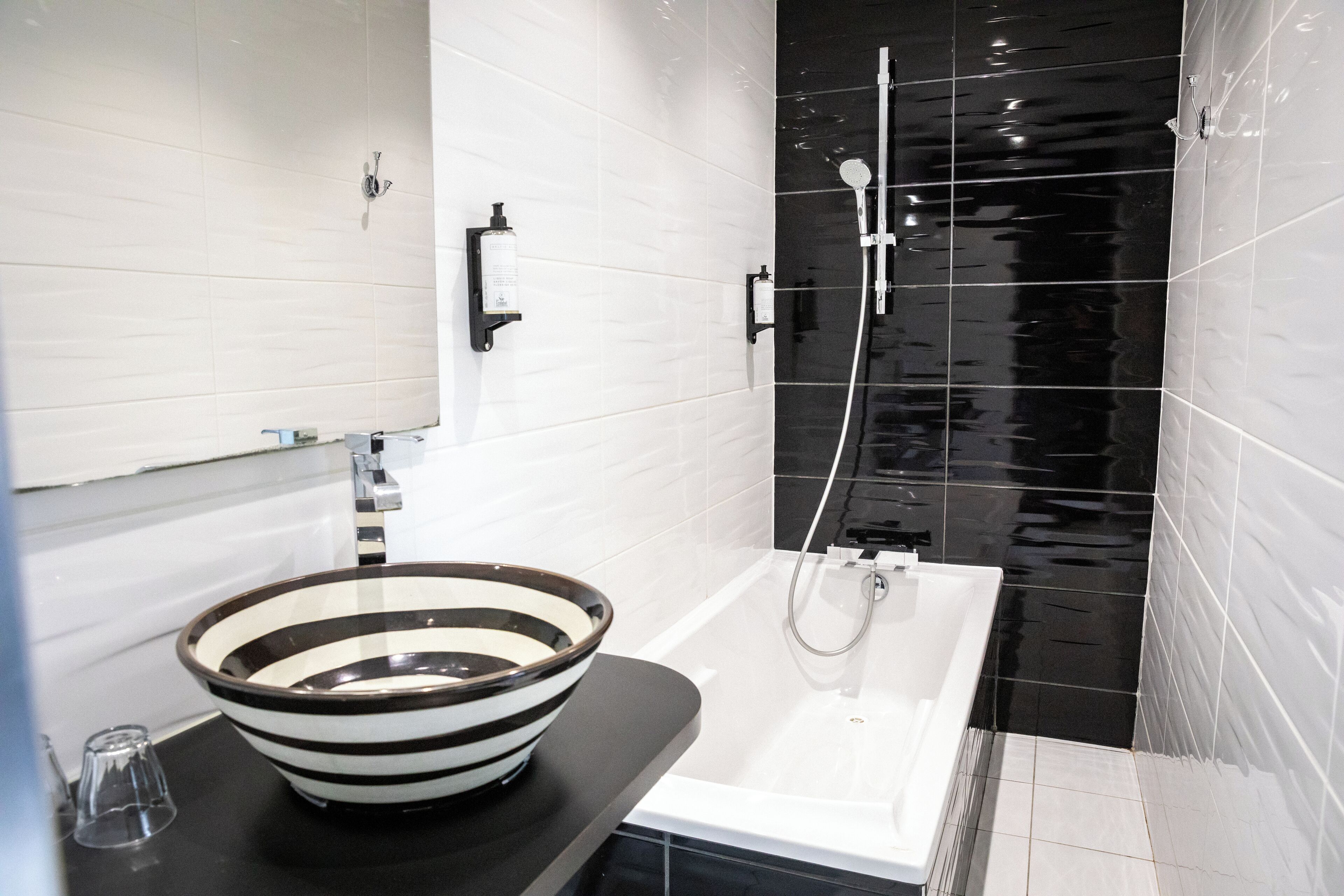 superior double room | bathroom | shower, free toiletries, hair dryer, towels