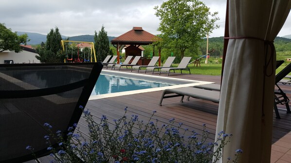 Outdoor pool, pool loungers