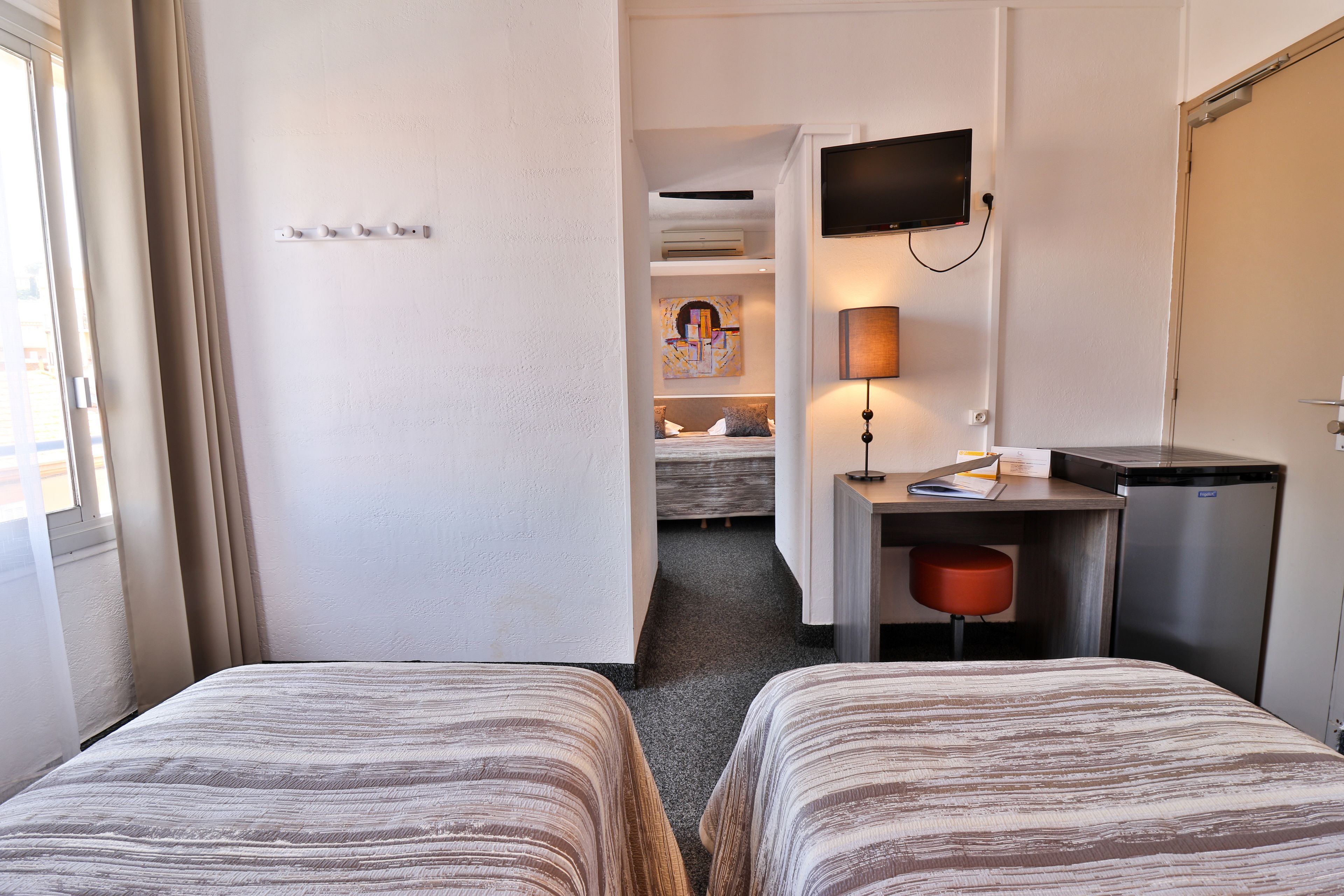 superior room (family) | premium bedding, in-room safe, desk, iron/ironing board