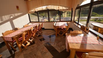 Breakfast, dinner served; Regional cuisine, garden views