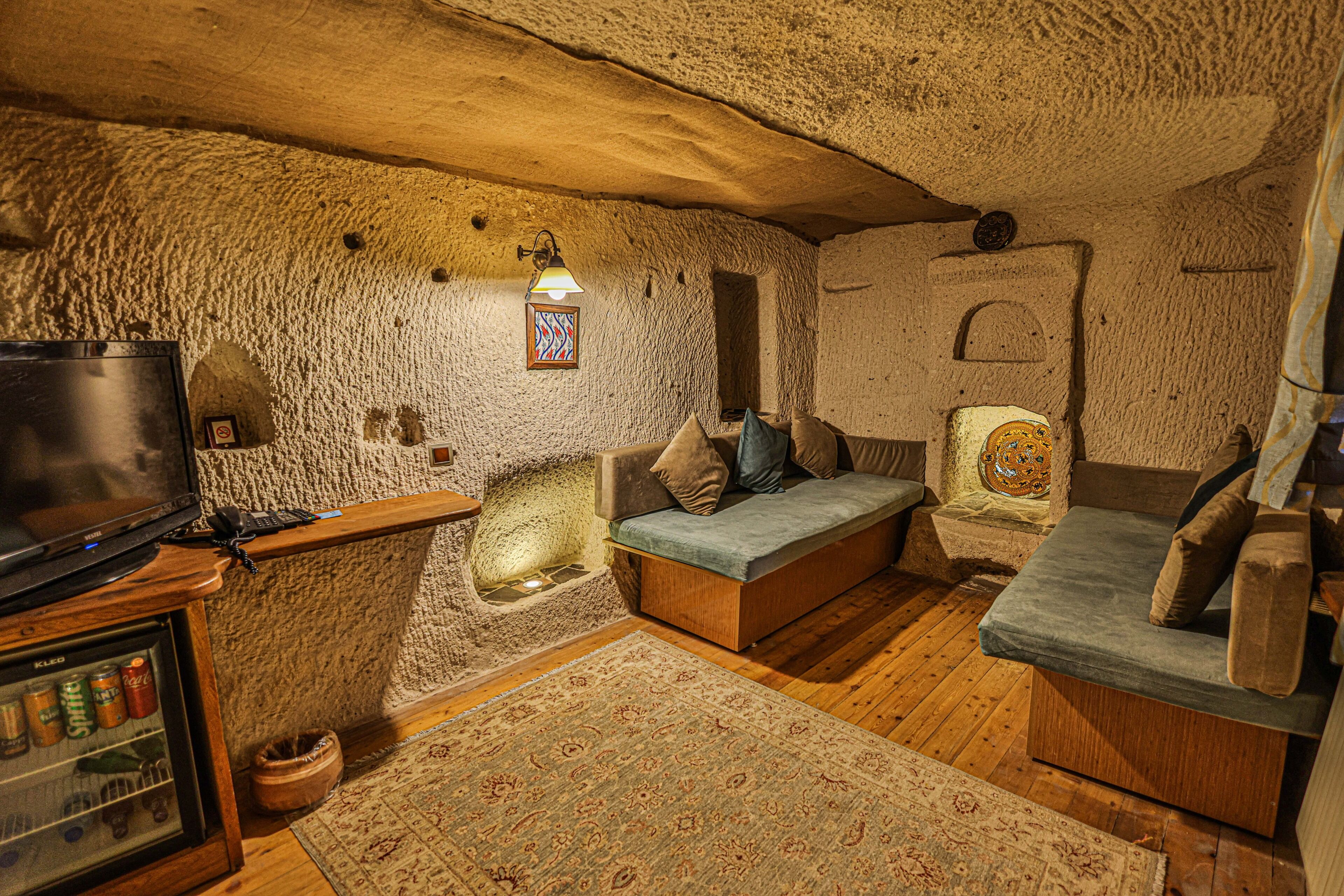 comfort cave suite | living area | lcd tv