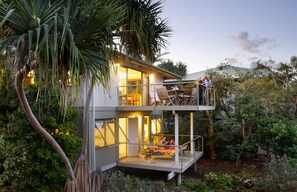 A modern house with a balcony and a covered outdoor area. - The Retreat Beach Houses (Peregian Beach)