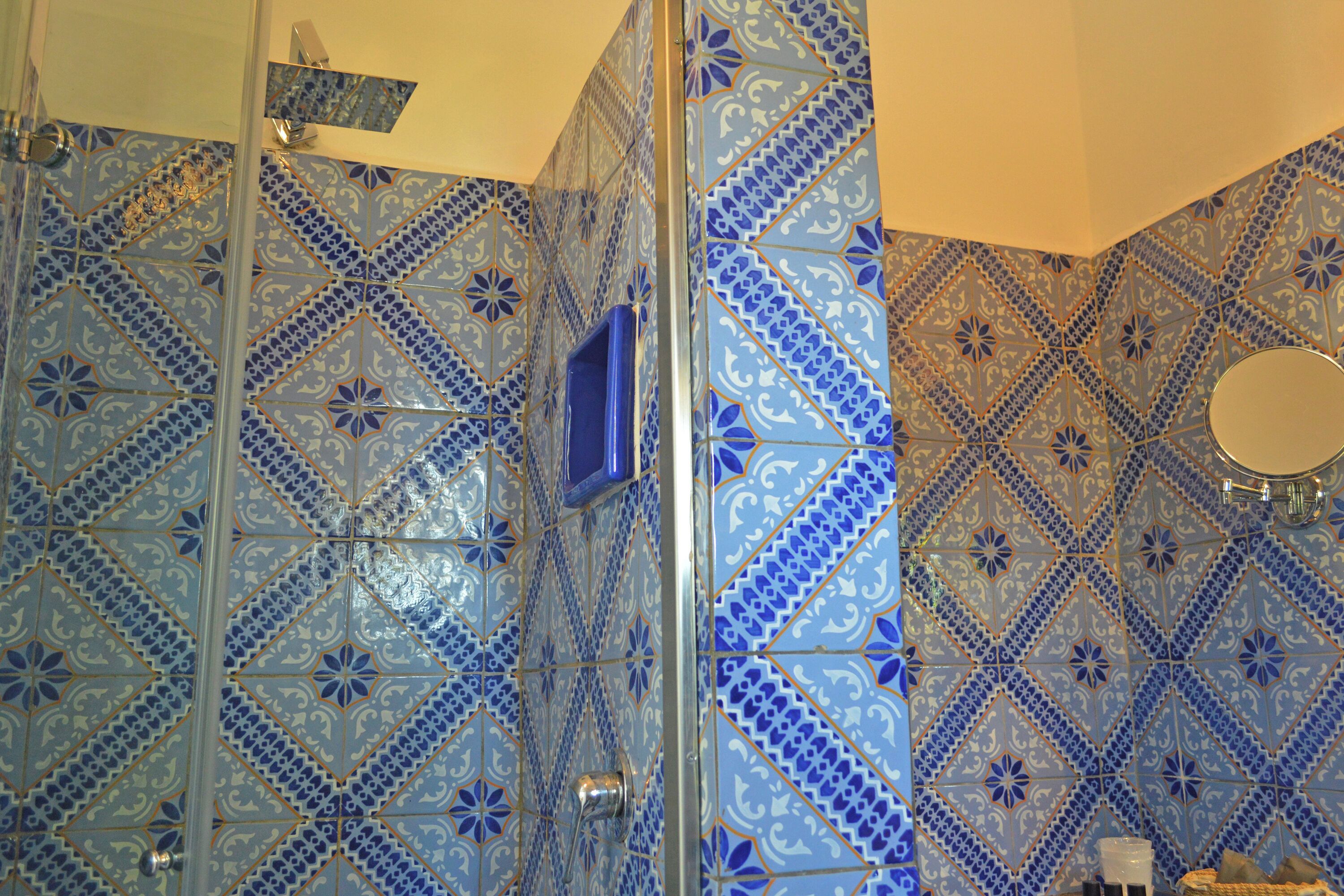 superior triple room | bathroom | shower, rainfall showerhead, free toiletries, hair dryer