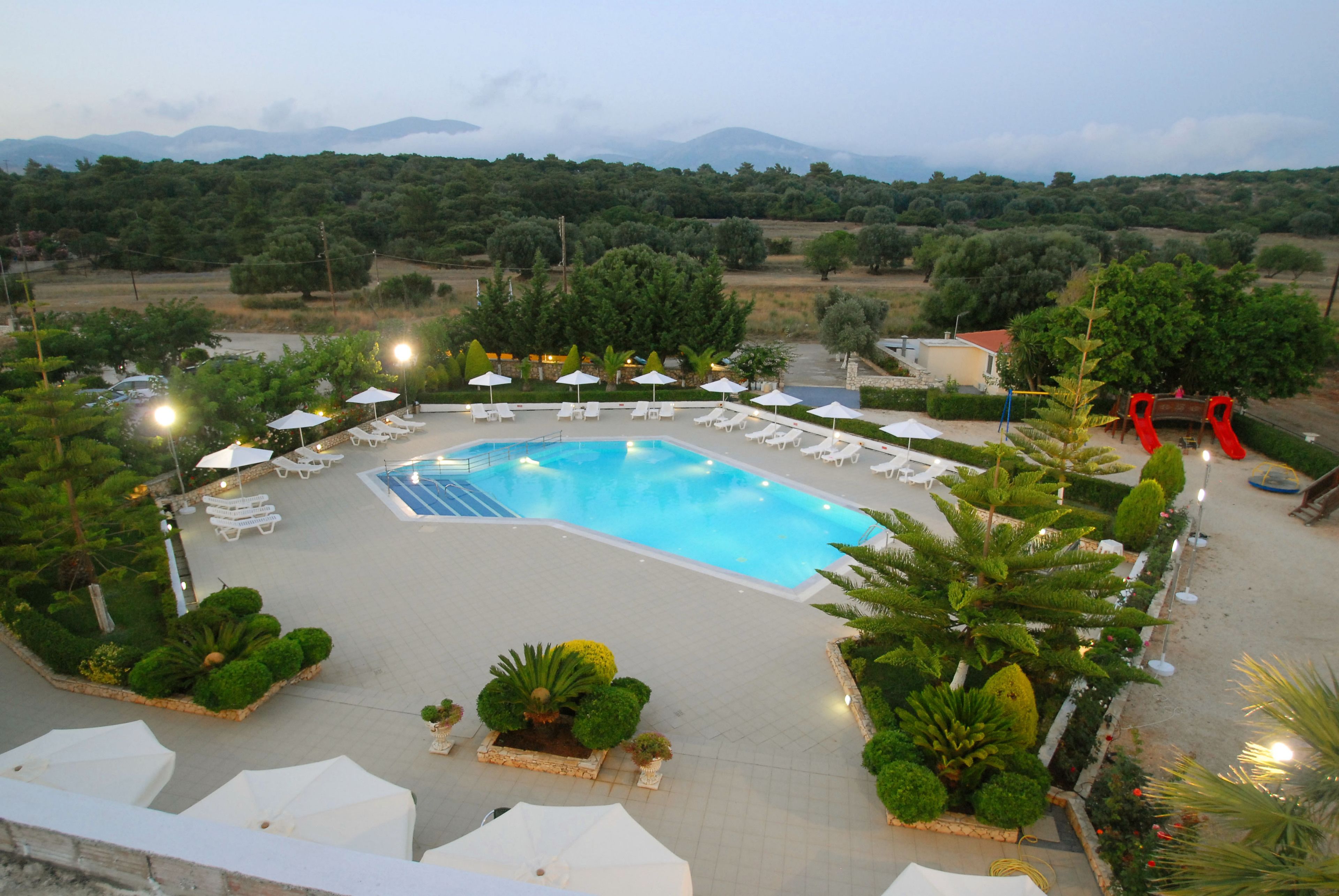 outdoor pool, open 6 am to 9 pm, pool umbrellas, pool loungers