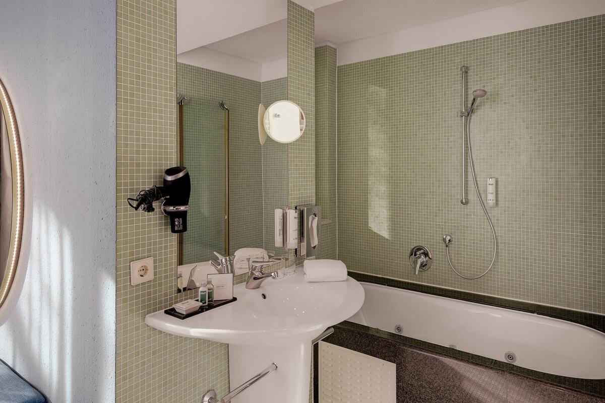 hair dryer, towels, soap, shampoo