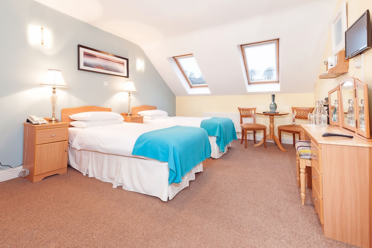 Desk, iron/ironing board, WiFi (free), bed sheets