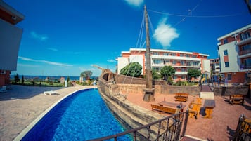 Outdoor pool, open 8 AM to 9 PM, pool umbrellas, sun loungers