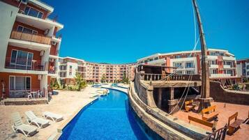 Outdoor pool, open 8 AM to 9 PM, pool umbrellas, sun loungers