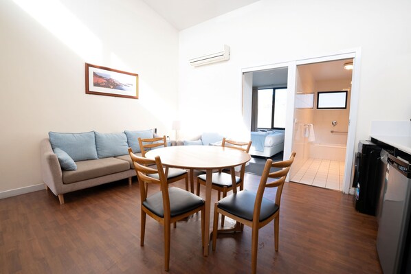 Two Bedroom Apartment | Living area | 40-inch flat-screen TV with digital channels