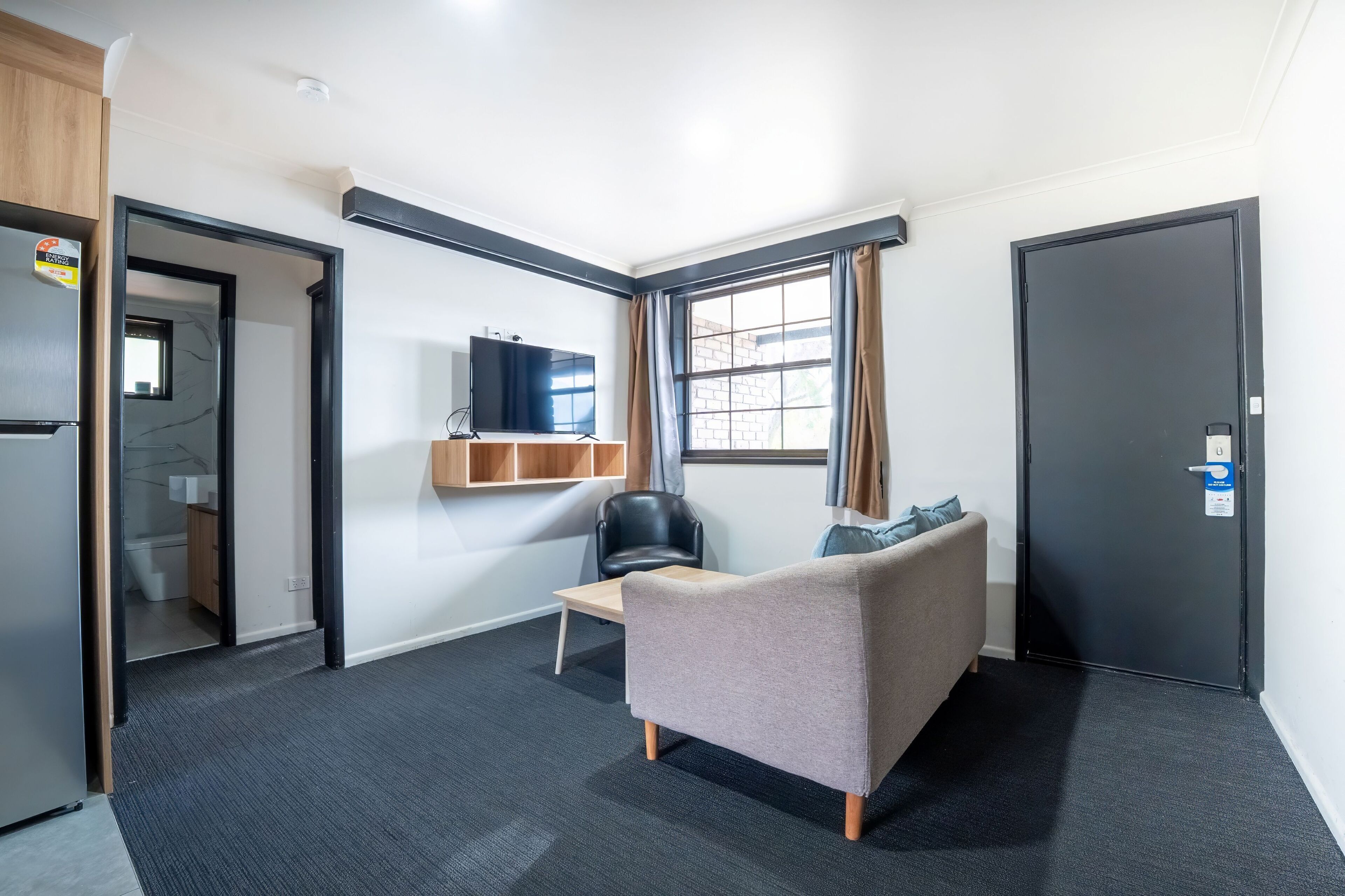 three bedroom apartment | living area | 40-inch flat-screen tv with digital channels