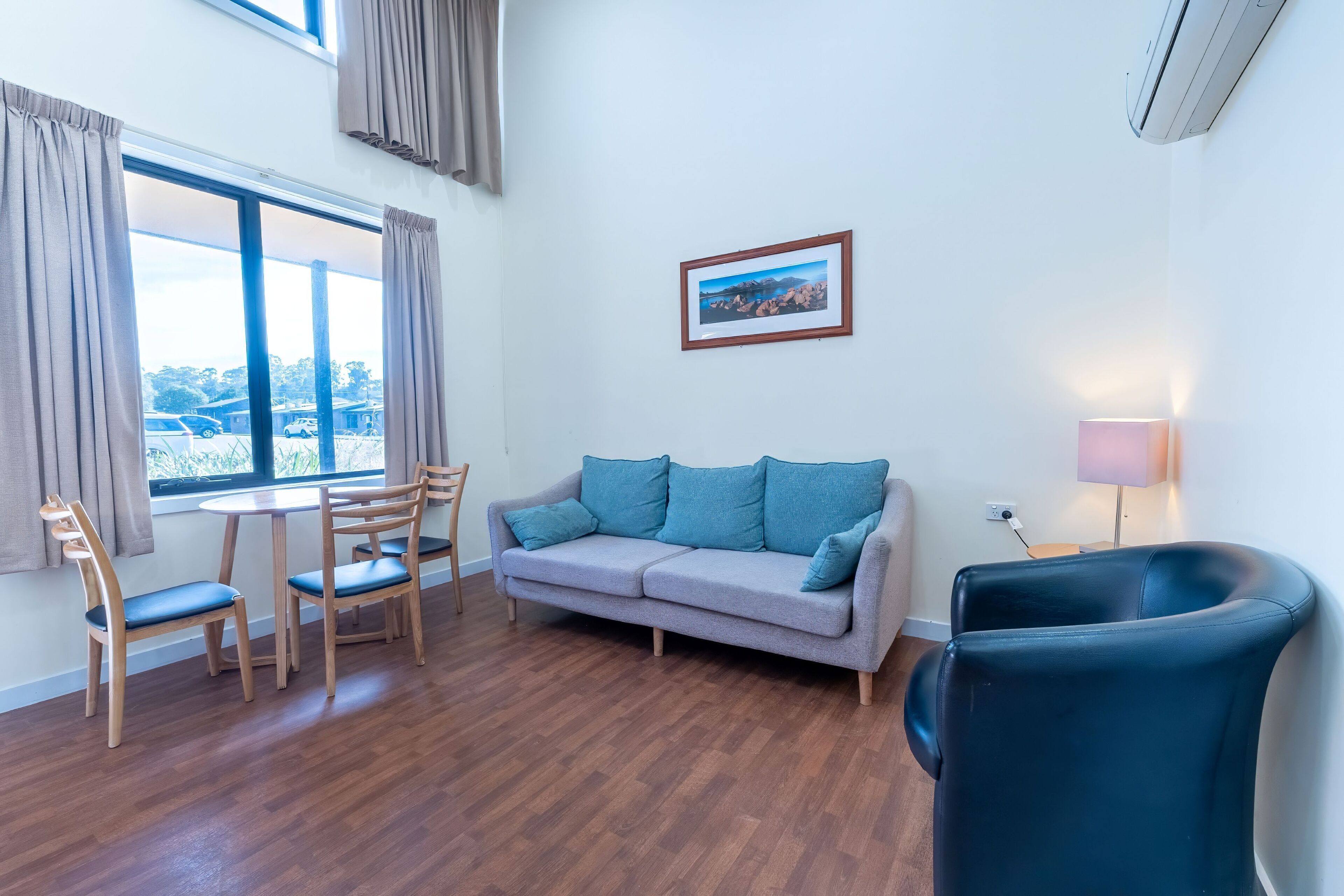 one bedroom apartment | living area | 40-inch flat-screen tv with digital channels