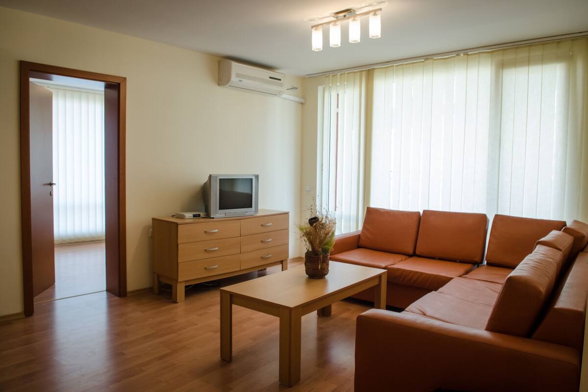 Apartment, 1 Bedroom (Free WiFi & Parking) | Living area | 24-inch LED TV with digital channels, TV