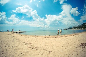 Private beach nearby, black sand, sun loungers, beach umbrellas