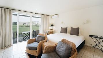 Individually furnished, desk, laptop workspace, iron/ironing board