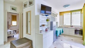 Familienapartment, 2 Schlafzimmer, Küche | Eigene Küche | Kühlschrank, Hochstuhl