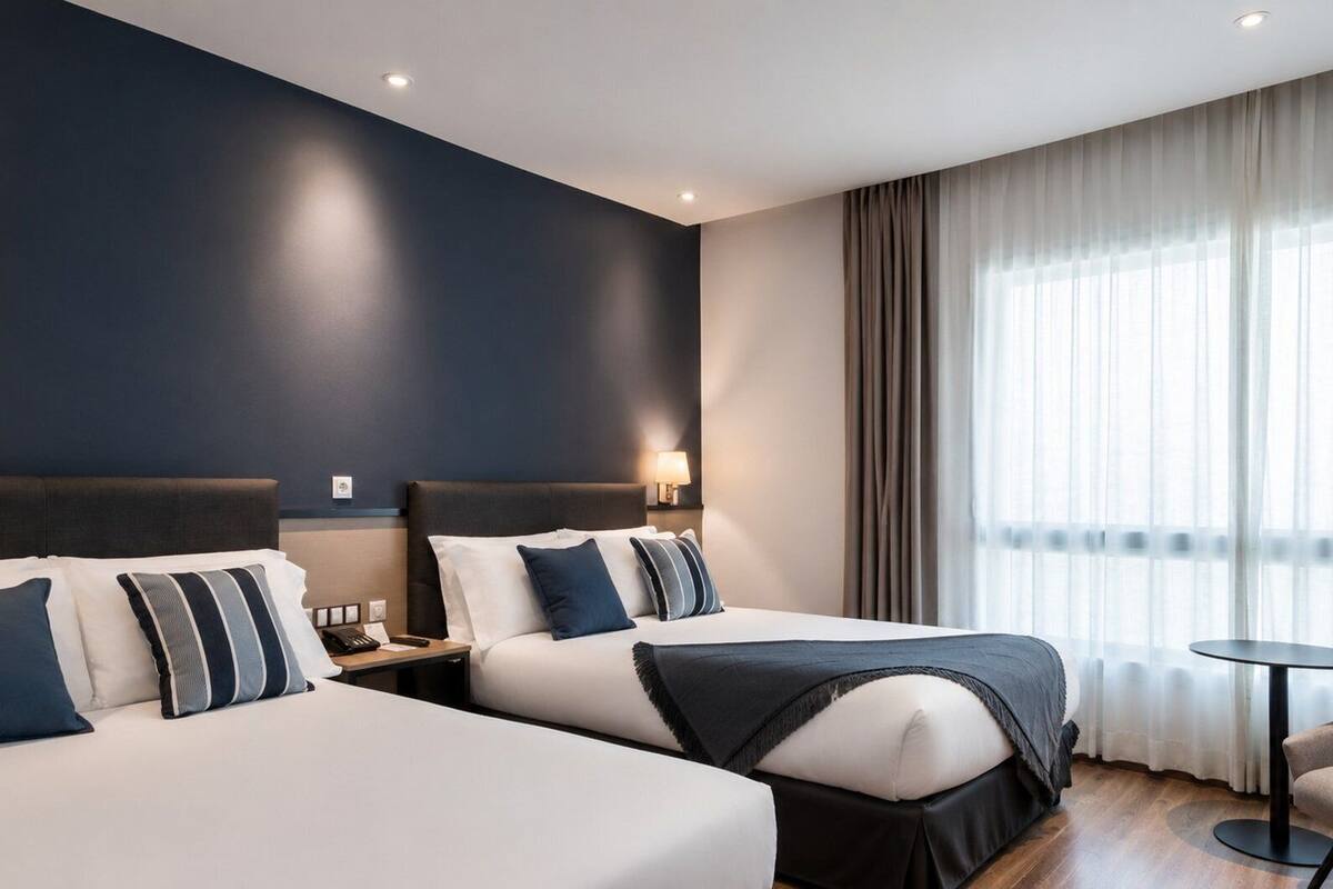 1 dormitorio, ropa de cama de alta calidad, minibar y caja fuerte