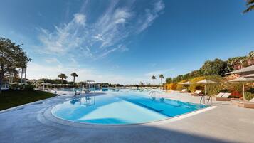 Outdoor pool, pool umbrellas, pool loungers