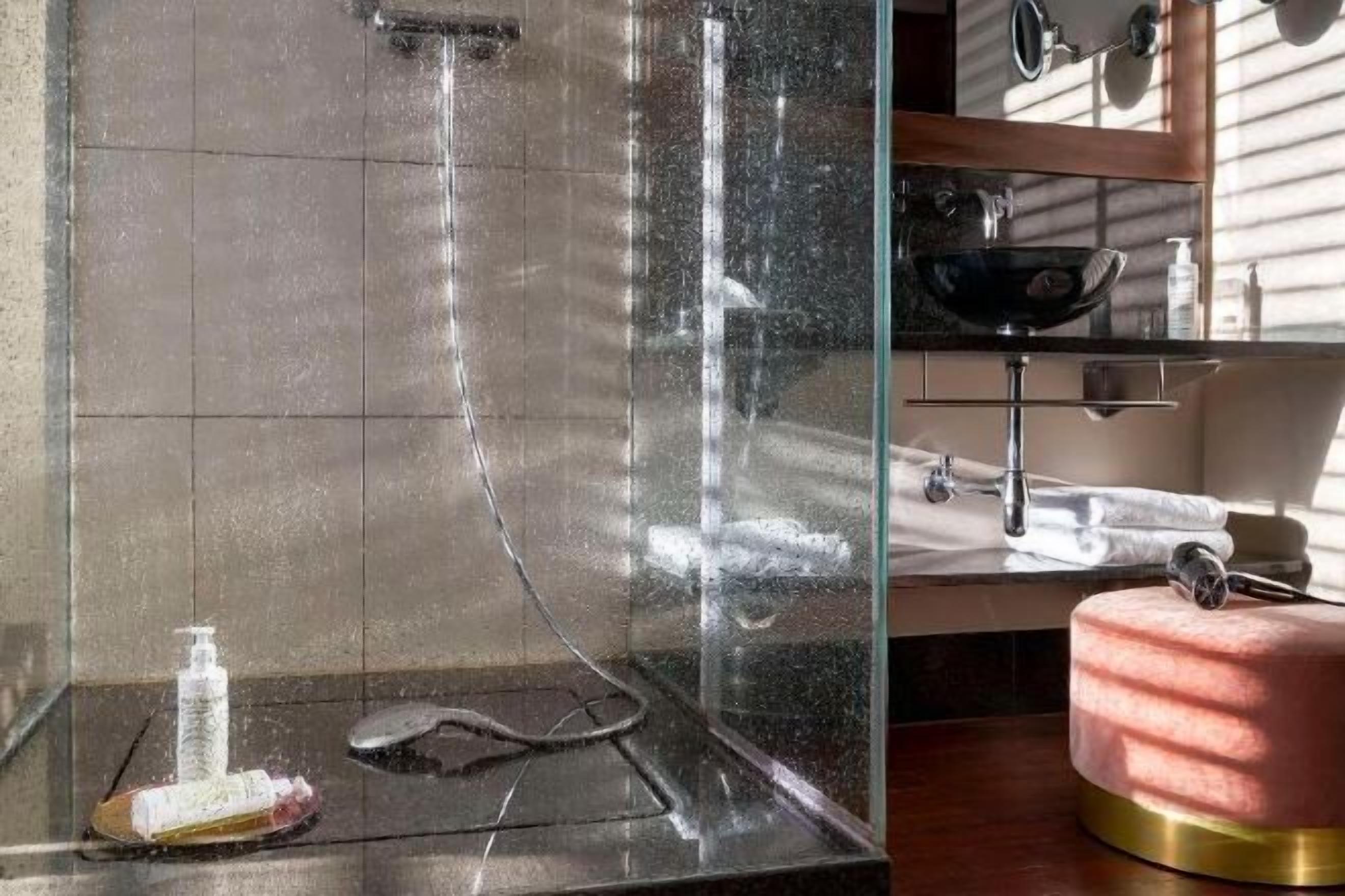 Bathroom | Shower, designer toiletries, hair dryer, slippers