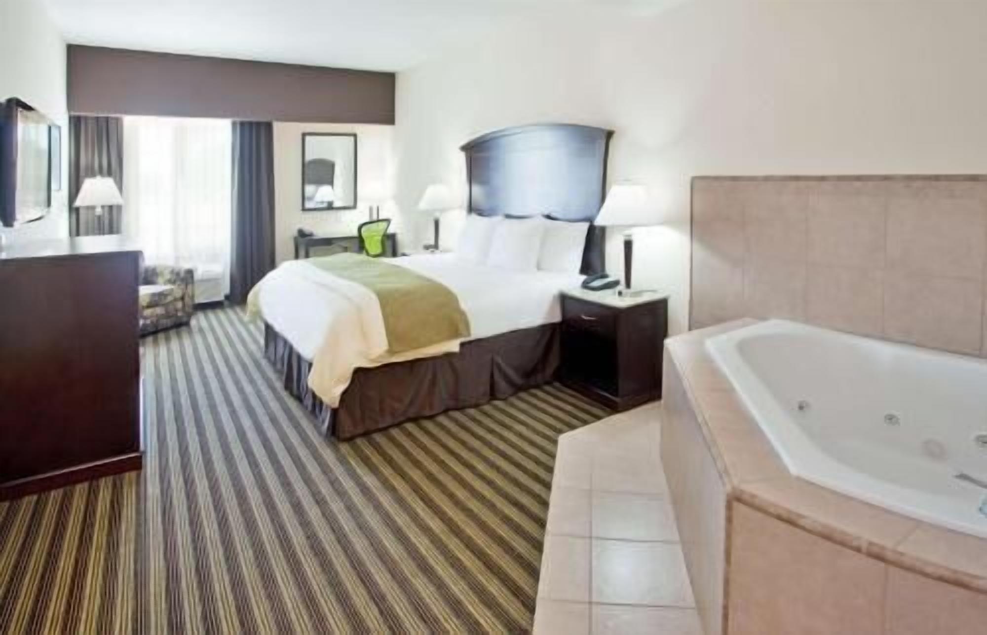 Premium bedding, down comforters, pillowtop beds, desk