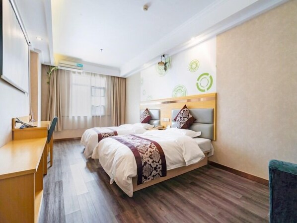Chambre supérieure avec lits jumeaux | Rideaux d’obscurcissement, accès au Wi-Fi (inclus)