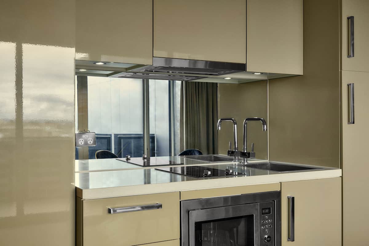 mini-fridge, microwave, stovetop, toaster