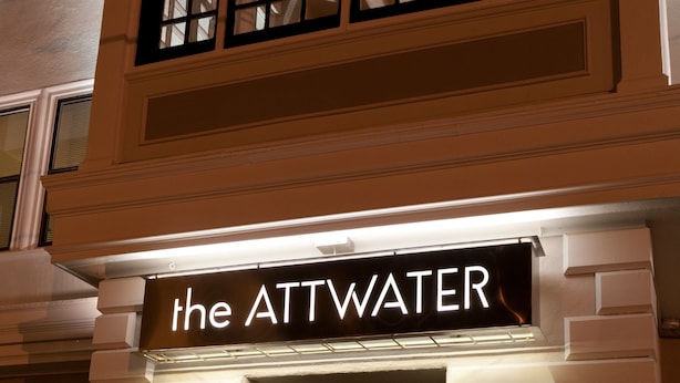 The exterior of a building with a sign that reads "the ATTWATER."