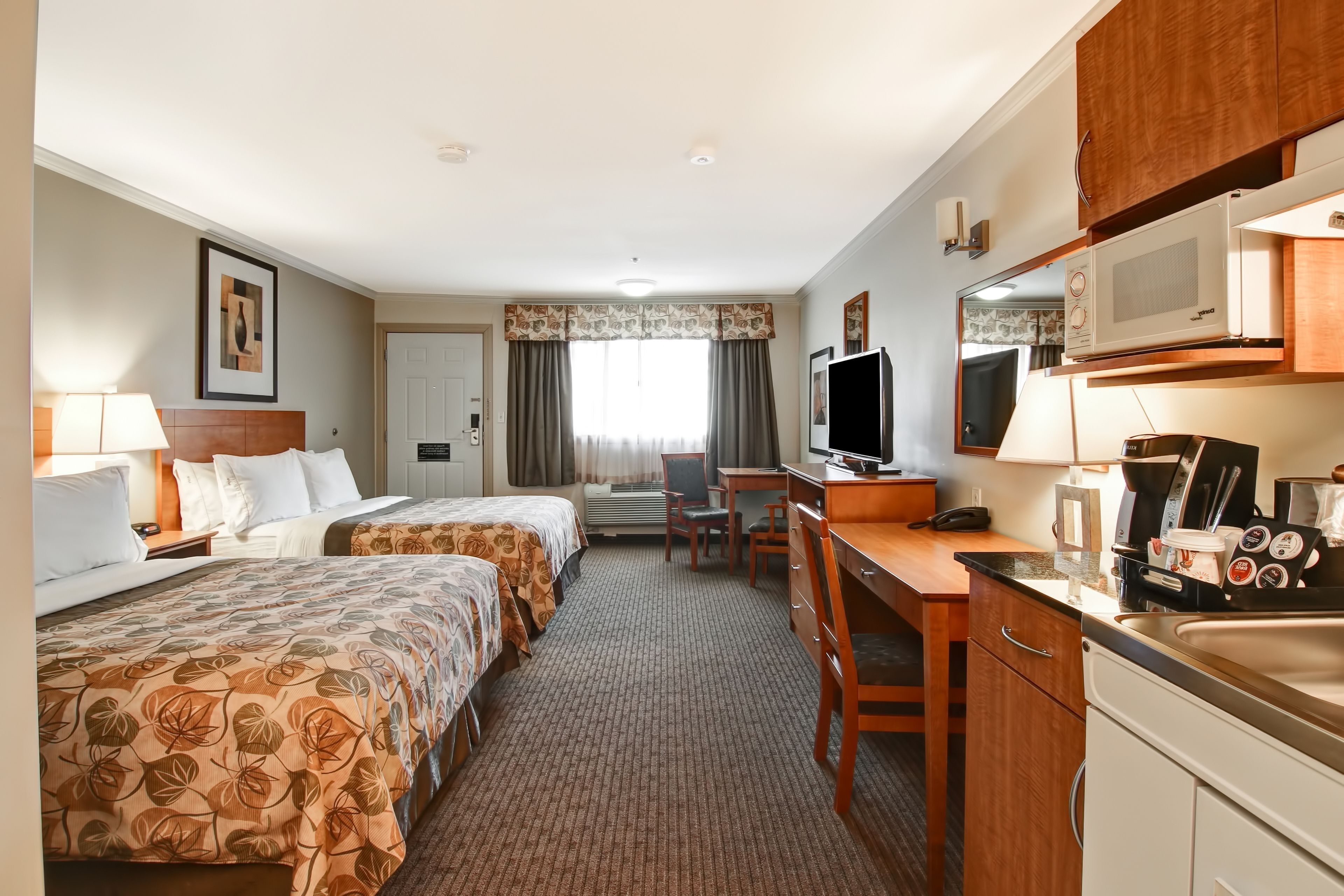 standard room, 2 queen beds | 1 bedroom, desk, laptop workspace, iron/ironing board