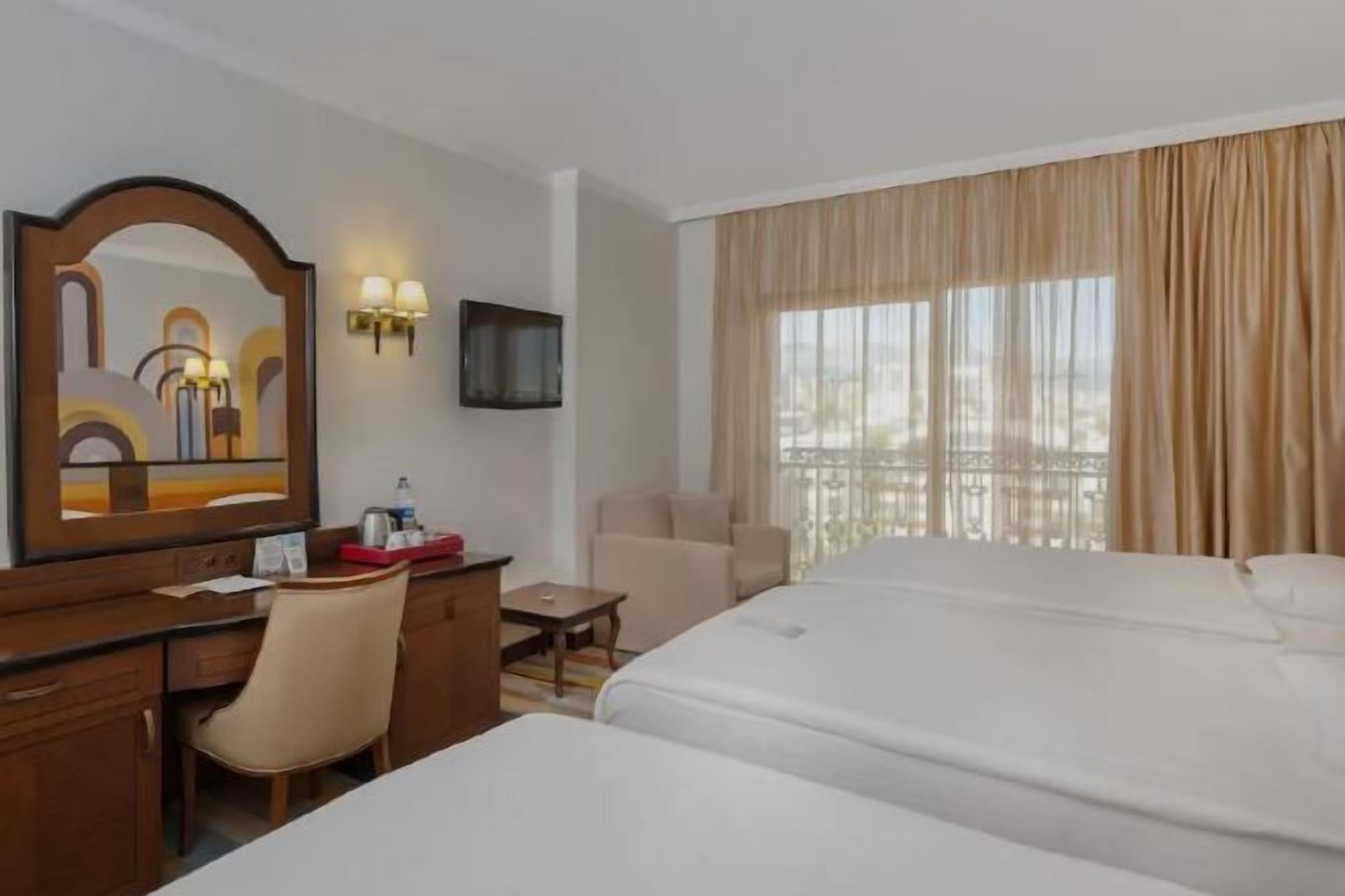 Premium bedding, free minibar, in-room safe, desk