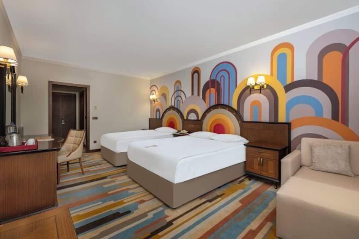 Premium bedding, free minibar, in-room safe, desk