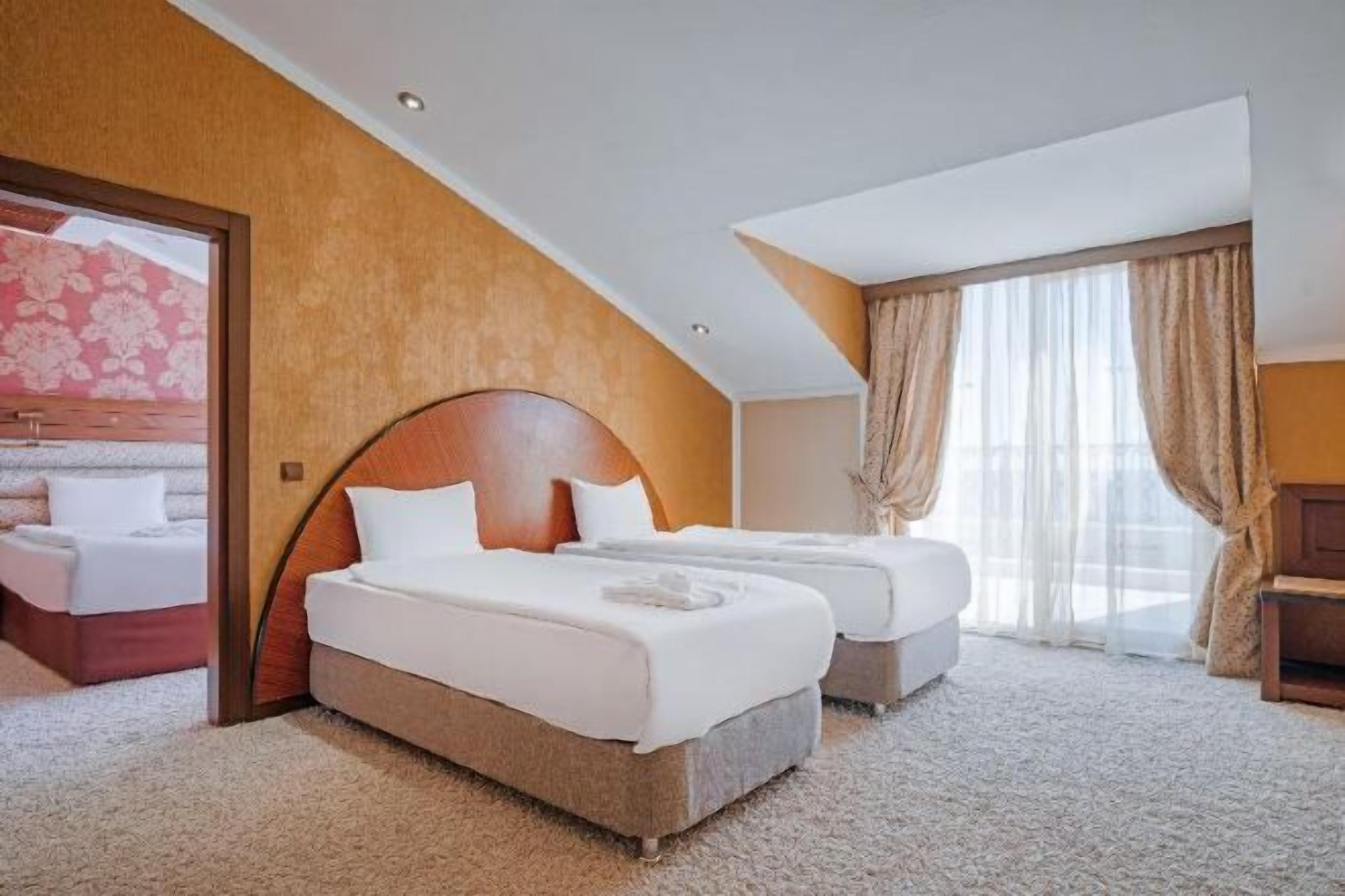 Premium bedding, free minibar, in-room safe, desk