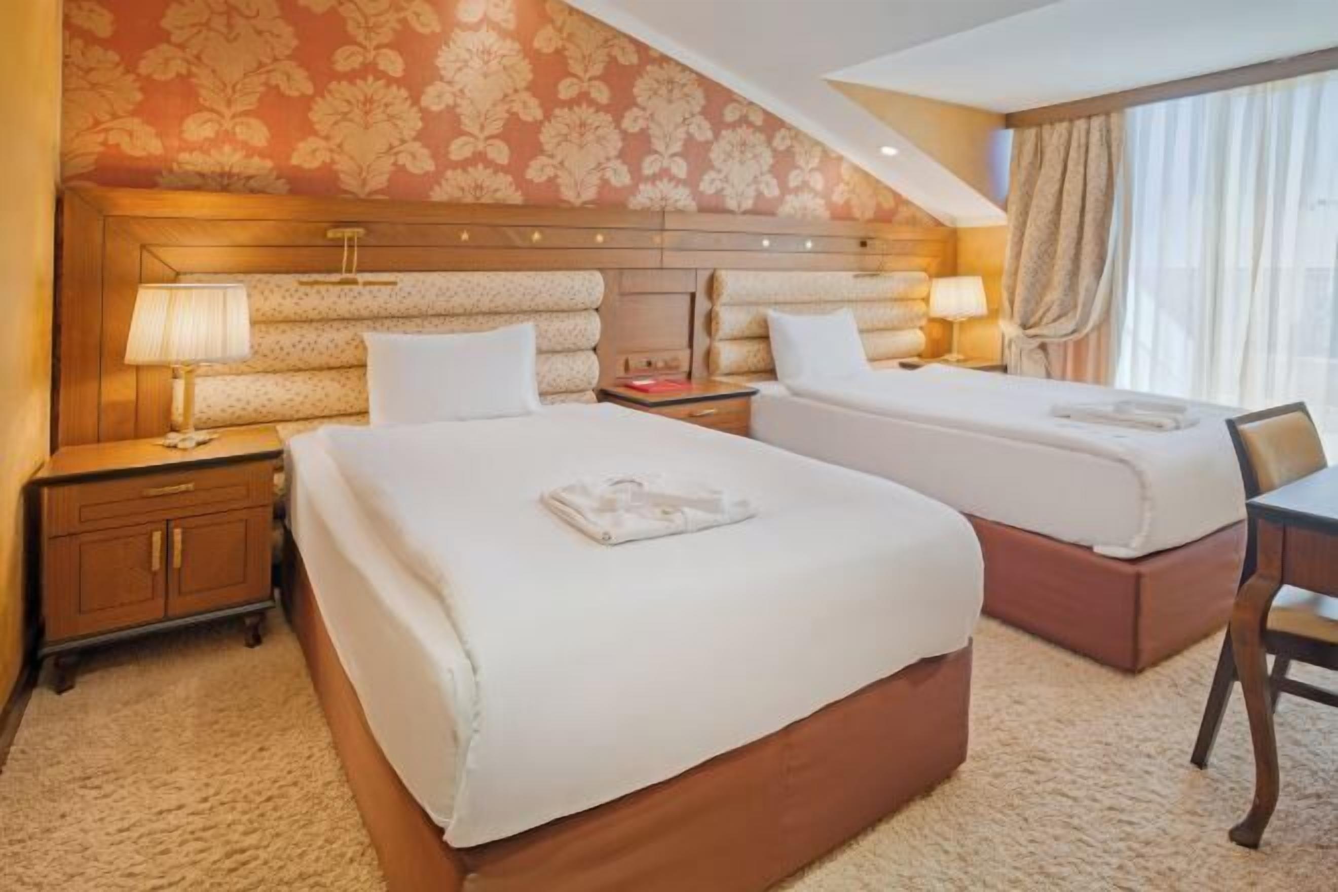 Premium bedding, free minibar, in-room safe, desk
