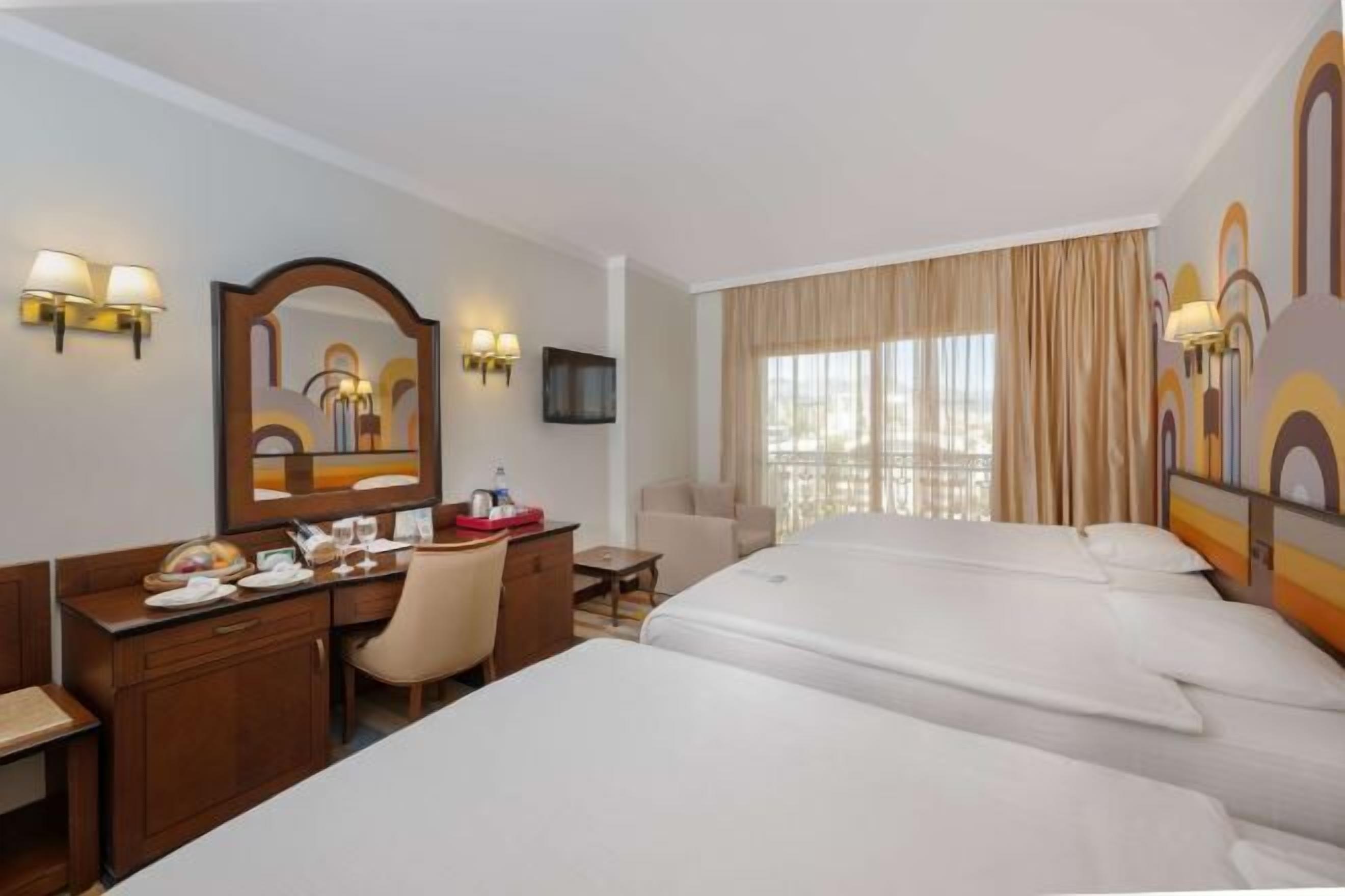 Premium bedding, free minibar, in-room safe, desk