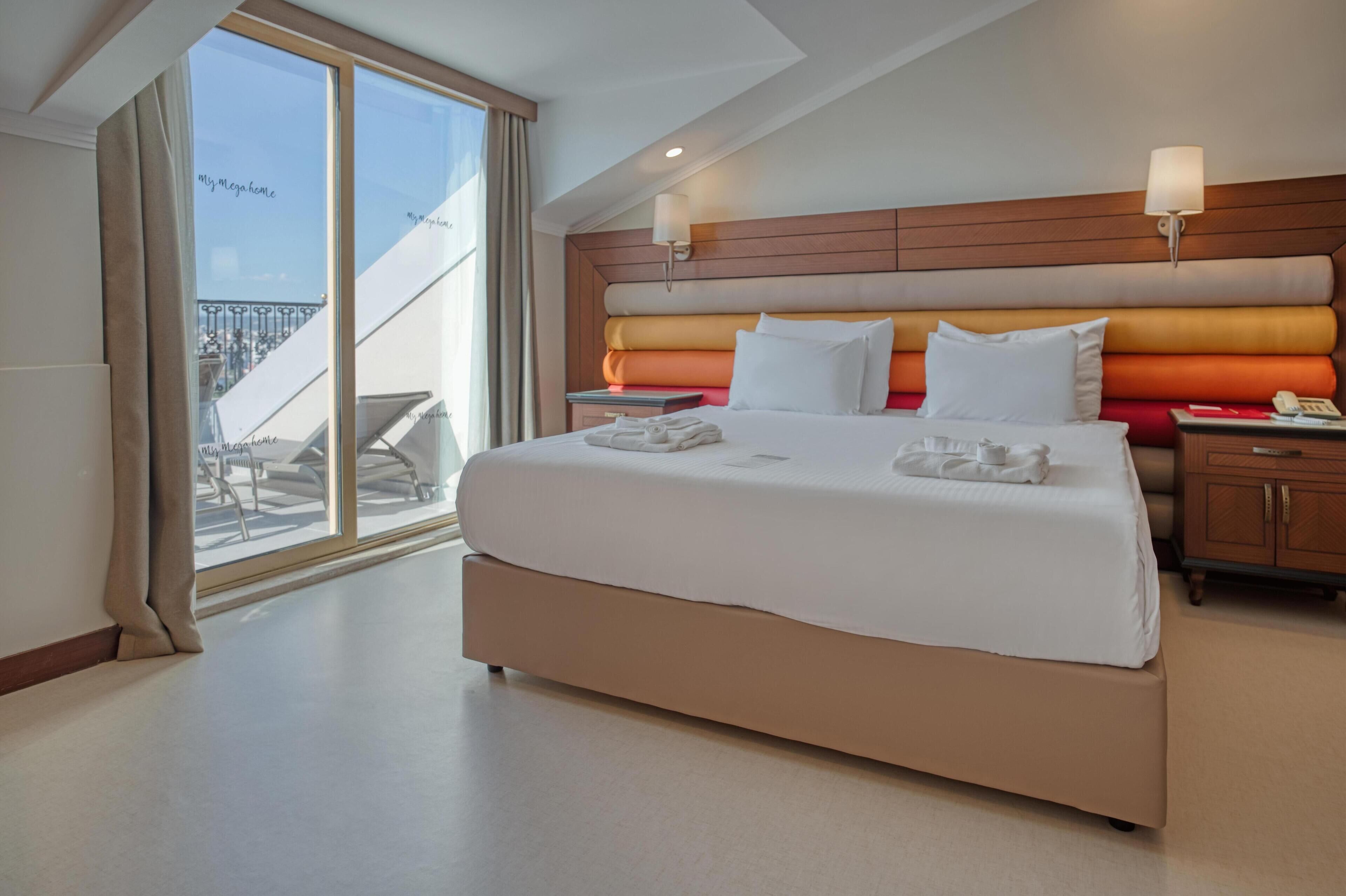 Suite Deluxe (Terrace) | Ropa de cama de alta calidad y artículos del minibar gratis 