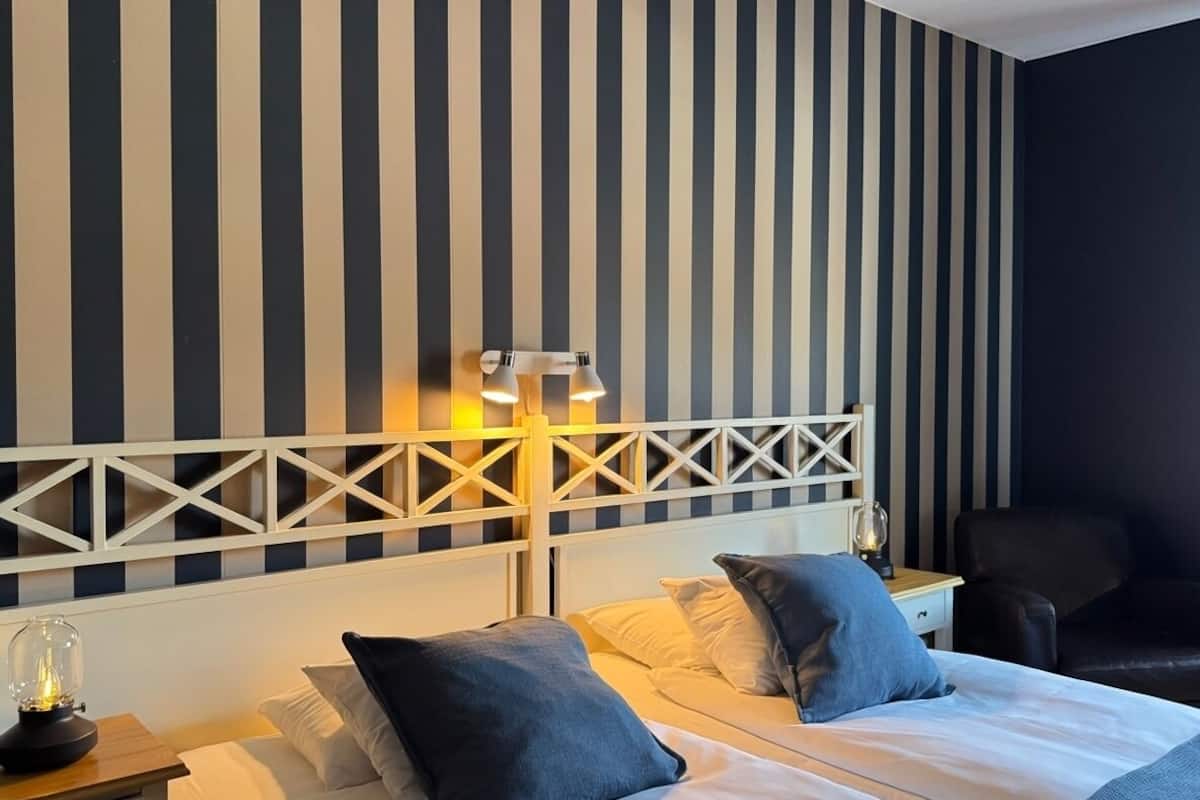 In-room safe, desk, blackout curtains, iron/ironing board