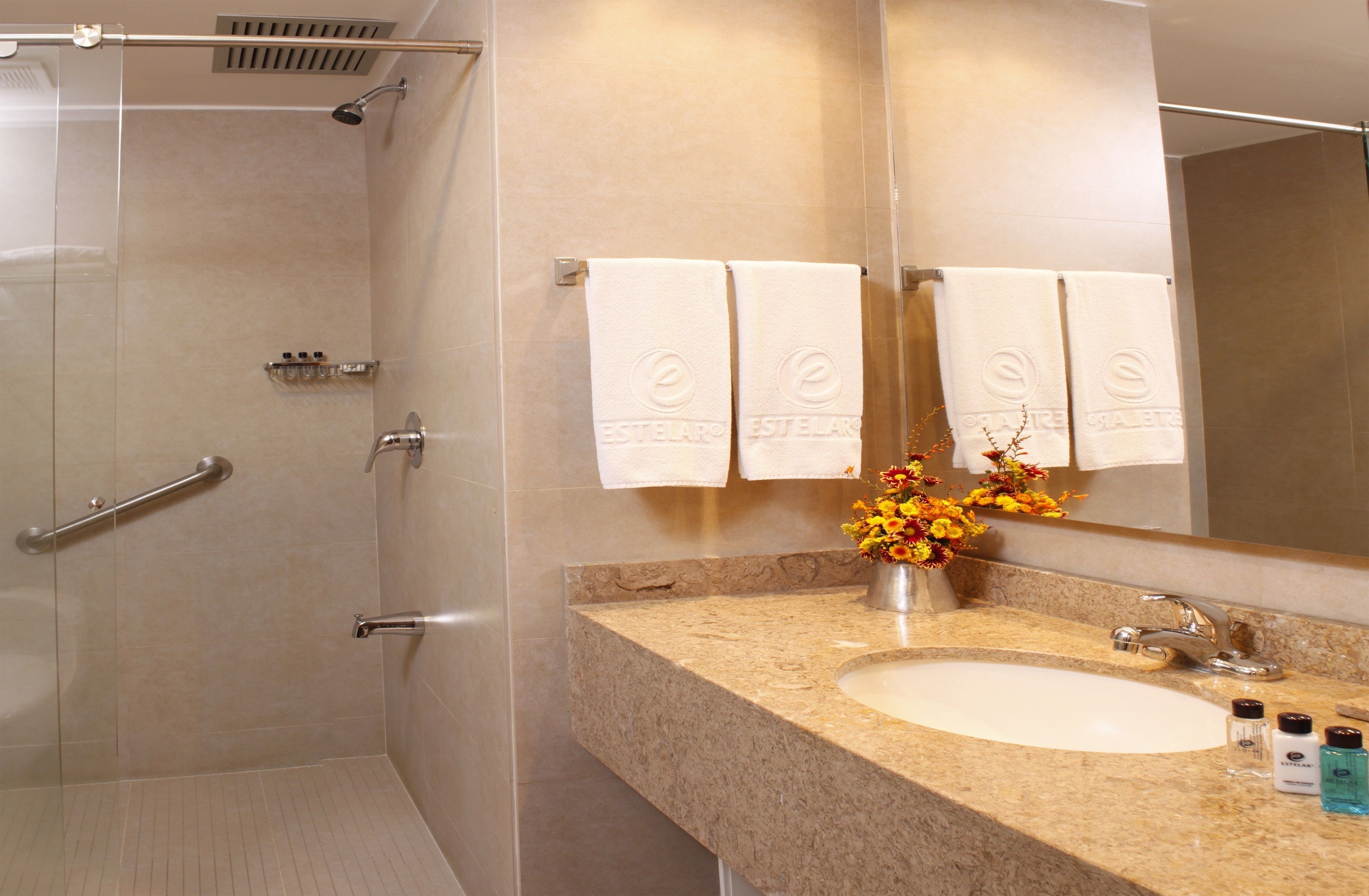 shower, rainfall showerhead, towels, soap