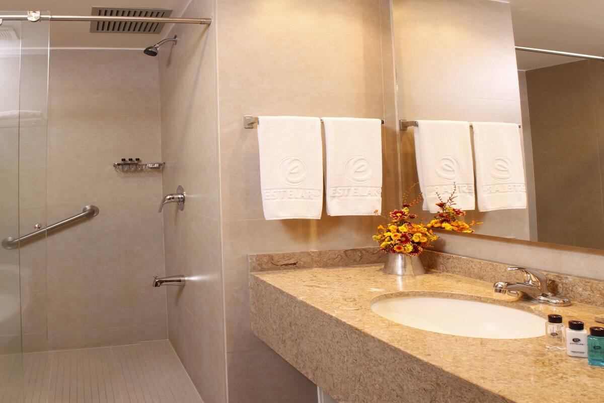 shower, rainfall showerhead, towels, soap