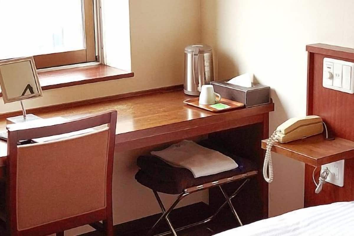 Desk, free WiFi, bed sheets